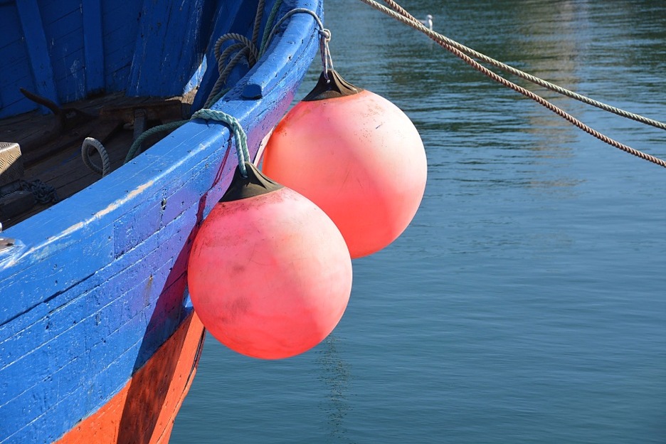 Fishing boat with buoys